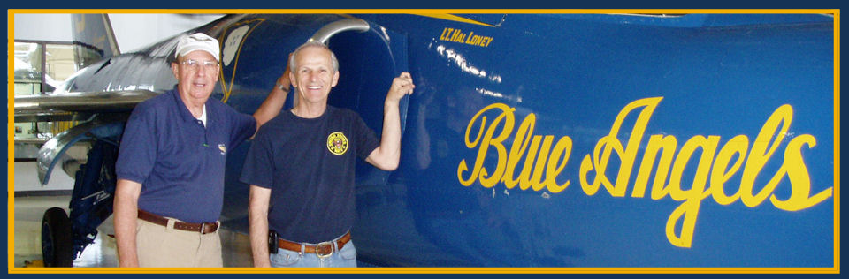 Hal Loney alonside his Blue Angels F-11 Plane at the Museum