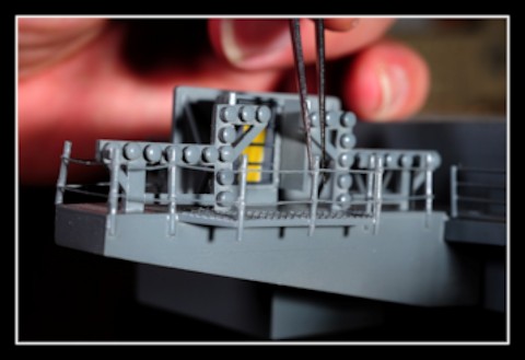 Showing scale of USS Oriskany model