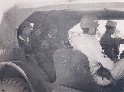 Some of the crew are moved by Jeep to their quarters